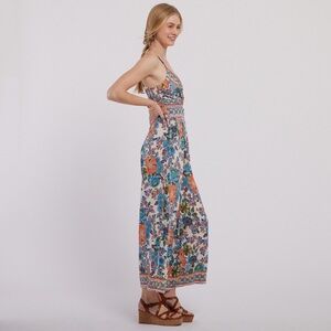 Angie brand twist-front floral jumpsuit. 
Medium